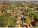 Wide aerial view of neighborhood and surrounding area at 158 Ashwood Ct, Riverdale, GA 30274