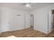 Bright bedroom with wood-look floors and ample closet space at 158 Ashwood Ct, Riverdale, GA 30274