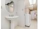 Basement bathroom with pedestal sink, toilet and laundry hookups at 201 Vistawood Ln, Marietta, GA 30066