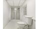 Basement bathroom with toilet, sink, and shower at 201 Vistawood Ln, Marietta, GA 30066
