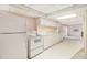 White kitchen appliances and cabinets in the basement at 201 Vistawood Ln, Marietta, GA 30066