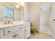 White vanity with gold accents and a vintage toilet at 201 Vistawood Ln, Marietta, GA 30066