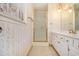Bathroom features a shower, vanity, and vintage wallpaper at 201 Vistawood Ln, Marietta, GA 30066