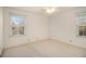 Bright bedroom with two windows and ceiling fan at 201 Vistawood Ln, Marietta, GA 30066