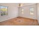Bedroom with new wood flooring and three windows at 201 Vistawood Ln, Marietta, GA 30066