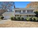 Two-story house with white siding, gray roof, and landscaping at 201 Vistawood Ln, Marietta, GA 30066