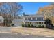 Two-story house with white siding, gray roof, and landscaping at 201 Vistawood Ln, Marietta, GA 30066