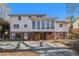 Rear view of house showing patio and screened porch at 201 Vistawood Ln, Marietta, GA 30066