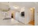 Clean kitchen featuring white cabinets, a built-in oven and a breakfast bar at 201 Vistawood Ln, Marietta, GA 30066