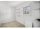 Unfinished storage room with shelving and a window at 201 Vistawood Ln, Marietta, GA 30066