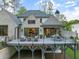 Elevated deck with seating area overlooking backyard at 1095 Curry Dr, Atlanta, GA 30319