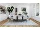 Bright dining room features hardwood floors and large windows at 1095 Curry Dr, Atlanta, GA 30319