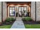 Inviting front porch with seating area at 1095 Curry Dr, Atlanta, GA 30319