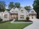 Elegant two-story house with brick facade and attached garage at 1095 Curry Dr, Atlanta, GA 30319