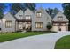 Elegant two-story house with brick facade and attached garage at 1095 Curry Dr, Atlanta, GA 30319