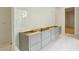 Bathroom features modern vanity area and tile flooring at 825 Kenry Ct, Atlanta, GA 30342