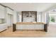 View of the spacious kitchen area and large island with custom cabinets at 825 Kenry Ct, Atlanta, GA 30342