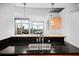 Kitchen sink with stainless steel appliances and a window with a beautiful view at 3324 Peachtree Ne Rd # 2718, Atlanta, GA 30326
