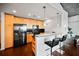 Modern kitchen with stainless steel appliances and breakfast bar at 3324 Peachtree Ne Rd # 2718, Atlanta, GA 30326