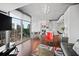 Bright living room with dark wood floors, city views, and open floor plan at 3324 Peachtree Ne Rd # 2718, Atlanta, GA 30326