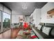 Open-concept living room with hardwood floors and floor-to-ceiling windows at 3324 Peachtree Ne Rd # 2718, Atlanta, GA 30326
