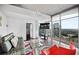 Bright living room featuring hardwood floors, modern decor, and city views at 3324 Peachtree Ne Rd # 2718, Atlanta, GA 30326
