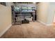 Finished basement featuring a lofted bed, comfortable seating, and carpet flooring, creating a versatile living space at 104 Streambank Ct, Temple, GA 30179