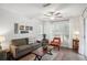 Living room with hardwood floors and large windows at 609 Mill Pond Se Dr, Smyrna, GA 30082