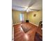 Bedroom displaying wood floors, a ceiling fan, and natural lighting at 6561 Harrington Pl, Douglasville, GA 30135