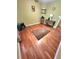 Bedroom showcasing hardwood floors, console table and natural light at 6561 Harrington Pl, Douglasville, GA 30135