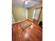 Bedroom with hardwood floors and natural light from the window at 6561 Harrington Pl, Douglasville, GA 30135