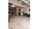 This garage has a mini fridge and storage shelving with neatly displayed contents at 6561 Harrington Pl, Douglasville, GA 30135