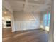 Dining room with hardwood floors, wainscoting, and chandelier at 3730 Reserve Overlook (Lot 8) Way, Cumming, GA 30041