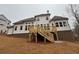 Two-story house with large deck and backyard at 3730 Reserve Overlook (Lot 8) Way, Cumming, GA 30041