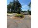 Curved road with landscaping and houses in the background at 3730 Reserve Overlook (Lot 8) Way, Cumming, GA 30041