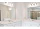 Double vanity bathroom with a large mirror and shower at 704 Hedwig Dr Lot 90, Mcdonough, GA 30252