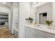 Modern bathroom with white vanity and bathtub at 704 Hedwig Dr Lot 90, Mcdonough, GA 30252