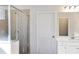 Bathroom with shower and white cabinets at 704 Hedwig Dr Lot 90, Mcdonough, GA 30252