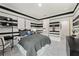 Spacious bedroom with black and white striped walls and private bathroom access at 704 Hedwig Dr Lot 90, Mcdonough, GA 30252