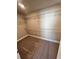 Walk-in closet with wire shelving units and carpet flooring at 245 Fountain Oak Way, Canton, GA 30114