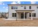 Backyard features covered patio with ceiling fan and view of the yard at 2517 Canopy Ct, Marietta, GA 30066