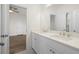 Double vanity bathroom with quartz countertops, shaker cabinets, and brushed gold faucets at 2517 Canopy Ct, Marietta, GA 30066