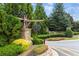 Community entrance sign amidst lush landscaping at 2517 Canopy Ct, Marietta, GA 30066