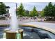 A relaxing community green area is highlighted by an ornate water fountain at 318 Sandy Springs Cir # 270, Sandy Springs, GA 30328