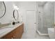 Modern bathroom with a double vanity, large walk-in shower, and a freestanding bathtub at 675 Drewry Ne St # 205, Atlanta, GA 30306