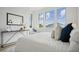 Bright bedroom with large windows, comfortable bed, and stylish decor at 675 Drewry Ne St # 205, Atlanta, GA 30306