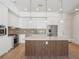 Modern kitchen with stainless steel appliances and island at 675 Drewry Ne St # 205, Atlanta, GA 30306