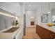 Modern kitchen with white cabinets and quartz countertops at 675 Drewry Ne St # 205, Atlanta, GA 30306