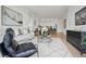 Spacious living room with large windows and modern decor at 675 Drewry Ne St # 205, Atlanta, GA 30306