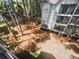 Exterior view of the apartment complex featuring mature trees that add to the building's privacy at 311 Granville Ct, Atlanta, GA 30328
